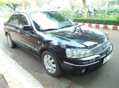 Cần bán xe Ford Laser 1.8AT 2004, màu đen như mới giá tốt