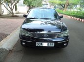 Cần bán xe Ford Laser 1.8AT 2004, màu đen như mới giá tốt