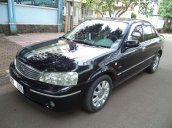 Cần bán xe Ford Laser 1.8AT 2004, màu đen như mới giá tốt