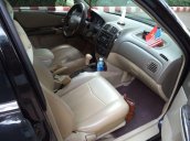 Cần bán xe Ford Laser 1.8AT 2004, màu đen như mới giá tốt