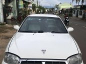 Cần bán gấp Kia Spectra 2003, màu trắng, giá cạnh tranh