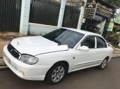 Cần bán gấp Kia Spectra 2003, màu trắng, giá cạnh tranh