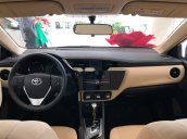 Bán lại xe Toyota Corolla Altis đời 2019, màu trắng, mới hoàn toàn