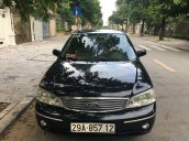 Bán Ford Laser AT đời 2004, màu đen, giá chỉ 240 triệu