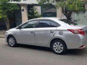 Bán xe Toyota Vios EMT sản xuất 2016, màu bạc xe gia đình