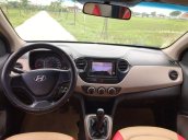 Cần bán Hyundai Grand i10 2015, màu trắng, xe nhập, xe gia đình