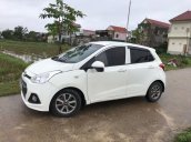 Cần bán Hyundai Grand i10 2015, màu trắng, xe nhập, xe gia đình