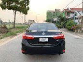 Cần bán gấp Toyota Camry 1.8GAT đời 2015, màu đen