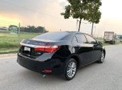 Cần bán gấp Toyota Camry 1.8GAT đời 2015, màu đen