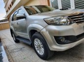 Bán ô tô Toyota Fortuner 2014, màu bạc xe nguyên bản