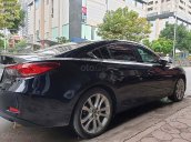 Cần bán xe Mazda 6 năm sản xuất 2014, màu đen, giá 660tr xe còn mới lắm