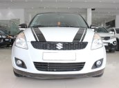 Cần bán Suzuki Swift 1.4AT sx 2016, số tự động, màu trắng, xe đẹp, giá còn TL