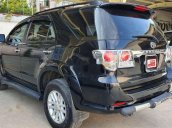 Bán xe Toyota Fortuner 2013, màu đen xe nguyên bản