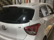 Bán ô tô Hyundai Grand i10 AT sản xuất năm 2014, màu trắng