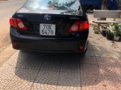 Cần bán Toyota Corolla đời 2010, màu đen, nhập khẩu nguyên chiếc