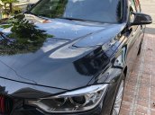 Bán xe BMW 320i 2015, màu đen