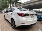 Bán Mazda 2 sản xuất năm 2015, màu trắng, chính chủ