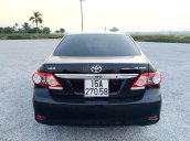 Cần bán lại xe Toyota Corolla Altis số sàn đời 2013, màu đen xe đẹp giá tốt 450 triệu đồng