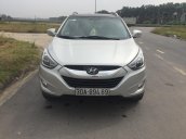 Bán xe Hyundai Tucson sản xuất 2014, màu bạc còn mới giá 670 triệu đồng