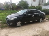 Cần bán lại xe Toyota Vios sản xuất 2014, màu đen  