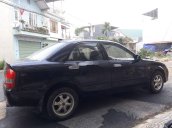 Bán Mazda 323 sản xuất 2004, màu đen còn mới, 139 triệu