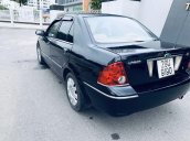 Bán ô tô Ford Laser đời 2004, màu đen còn mới