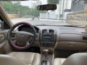 Bán ô tô Ford Laser đời 2004, màu đen còn mới