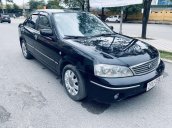 Bán ô tô Ford Laser đời 2004, màu đen còn mới