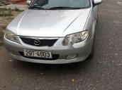 Cần bán gấp Mazda 323 năm 2004, màu bạc còn mới