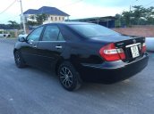 Bán Toyota Camry đời 2004, màu đen còn mới