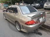 Cần bán lại xe Mitsubishi Lancer sản xuất năm 2003, màu bạc