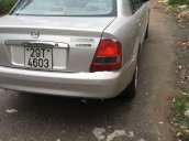 Cần bán gấp Mazda 323 năm 2004, màu bạc còn mới