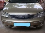 Cần bán xe Ford Laser năm 2003, màu vàng số tự động