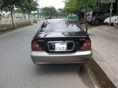 Chính chủ bán Daewoo Magnus đời 2004, màu đen, 135 triệu