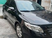 Cần bán Toyota Corolla Altis 1.8G 2010, màu đen