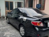 Cần bán Toyota Corolla Altis 1.8G 2010, màu đen