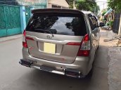 Cần bán lại xe Toyota Innova 2.0E năm 2016, màu vàng, số sàn