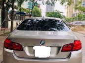 Cần bán xe chính chủ BMW 5 Series 523i đời 2011, màu vàng, dáng xe đẹp như mới