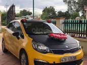 Bán Kia Rio 1.4 MT đời 2015, màu vàng, xe nhập 