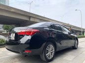 Bán Toyota Corolla Altis 1.8G AT năm sản xuất 2016, màu đen, giá 678tr