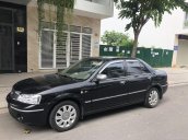 Cần bán Ford Laser 1.8 AT đời 2003, màu đen, nhập khẩu