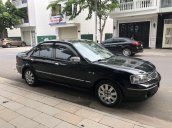 Cần bán Ford Laser 1.8 AT đời 2003, màu đen, nhập khẩu