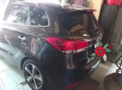 Cần bán xe Kia Rondo đời 2016, màu nâu xe gia đình