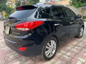 Cần bán gấp Hyundai Tucson 2.0 AT 4WD sản xuất 2011, màu đen 