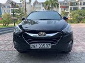 Cần bán gấp Hyundai Tucson 2.0 AT 4WD sản xuất 2011, màu đen 