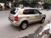 Bán xe Hyundai Tucson 2.0 AT năm sản xuất 2009, màu vàng, nhập khẩu nguyên chiếc 