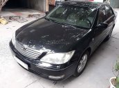 Cần bán xe Toyota Camry đời 2003, màu đen xe máy chạy êm