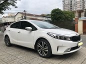 Bán gấp chiếc Kia Cerato 1.6 AT đời 2018 màu trắng xe đi ít, chạy tốt