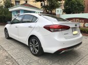 Bán gấp chiếc Kia Cerato 1.6 AT đời 2018 màu trắng xe đi ít, chạy tốt