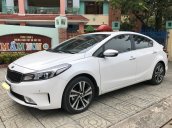 Bán gấp chiếc Kia Cerato 1.6 AT đời 2018 màu trắng xe đi ít, chạy tốt